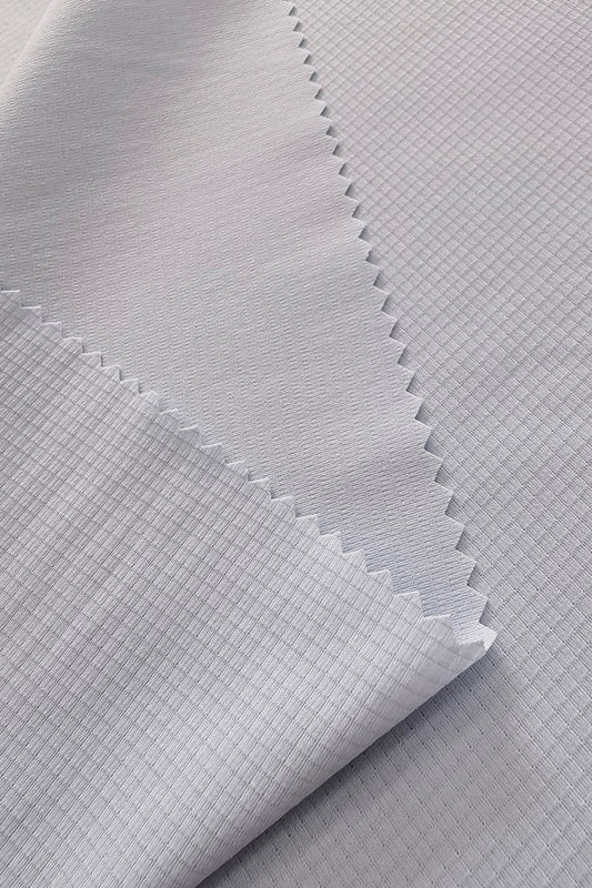 Cotton-Like Polyester Grid Jacquard Fabric – Quick-Dry, Antibacterial, and Durable for Activewear & Men’s Clothing