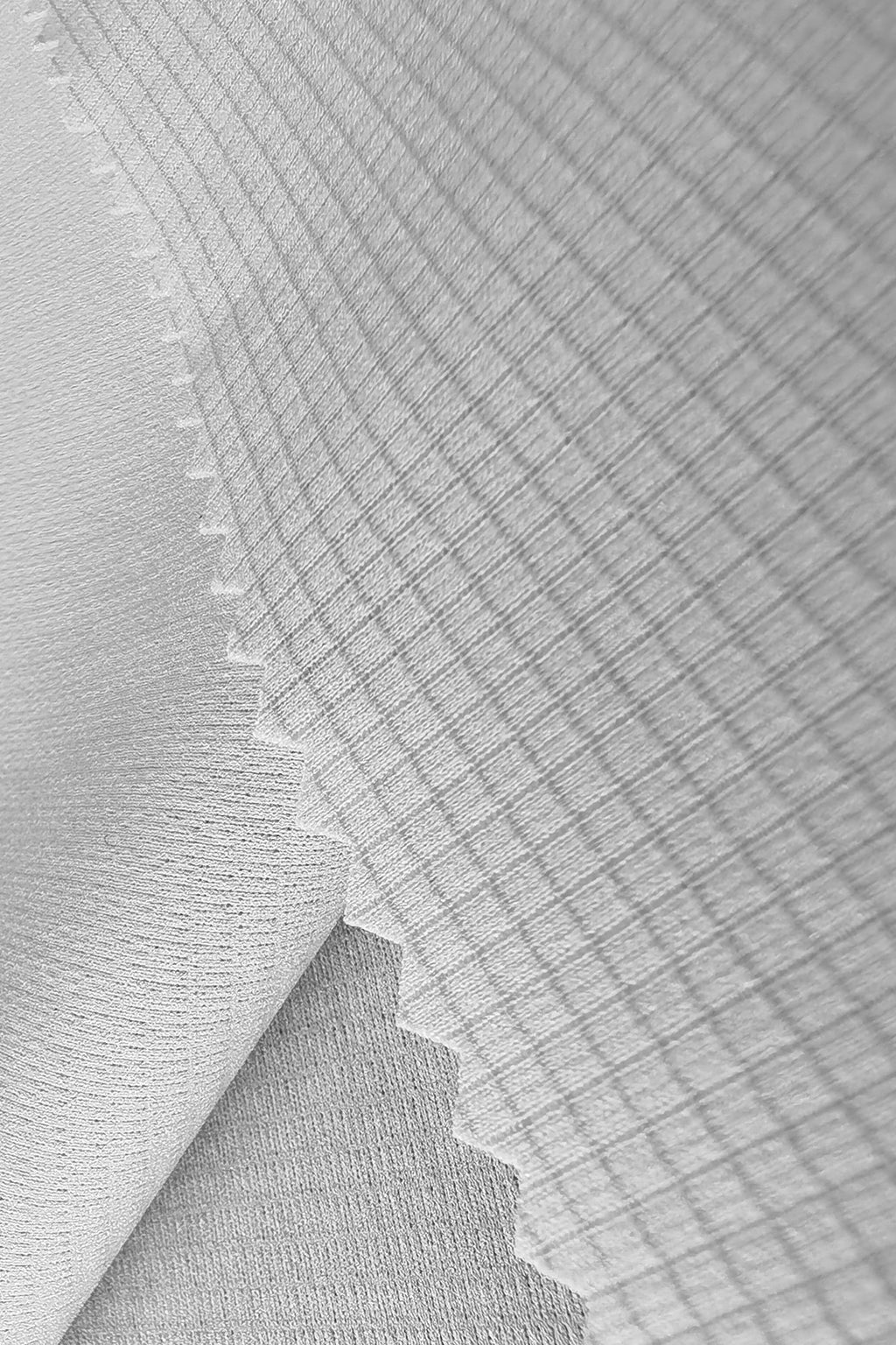 Cotton-Like Polyester Grid Jacquard Fabric – Quick-Dry, Antibacterial, and Durable for Activewear & Men’s Clothing