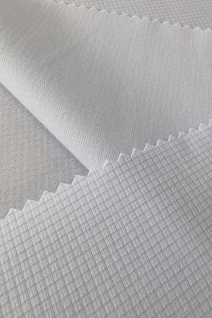 Cotton-Like Polyester Grid Jacquard Fabric – Quick-Dry, Antibacterial, and Durable for Activewear & Men’s Clothing